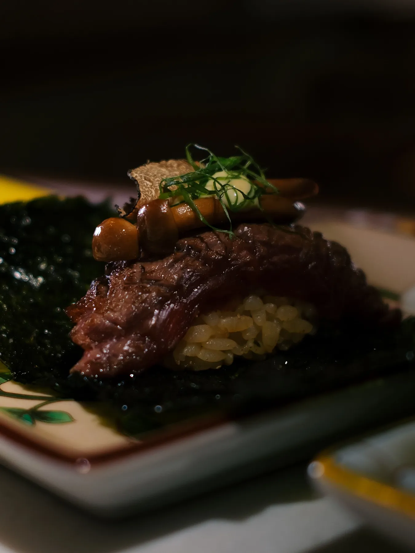 Small appetizer on a dark plate