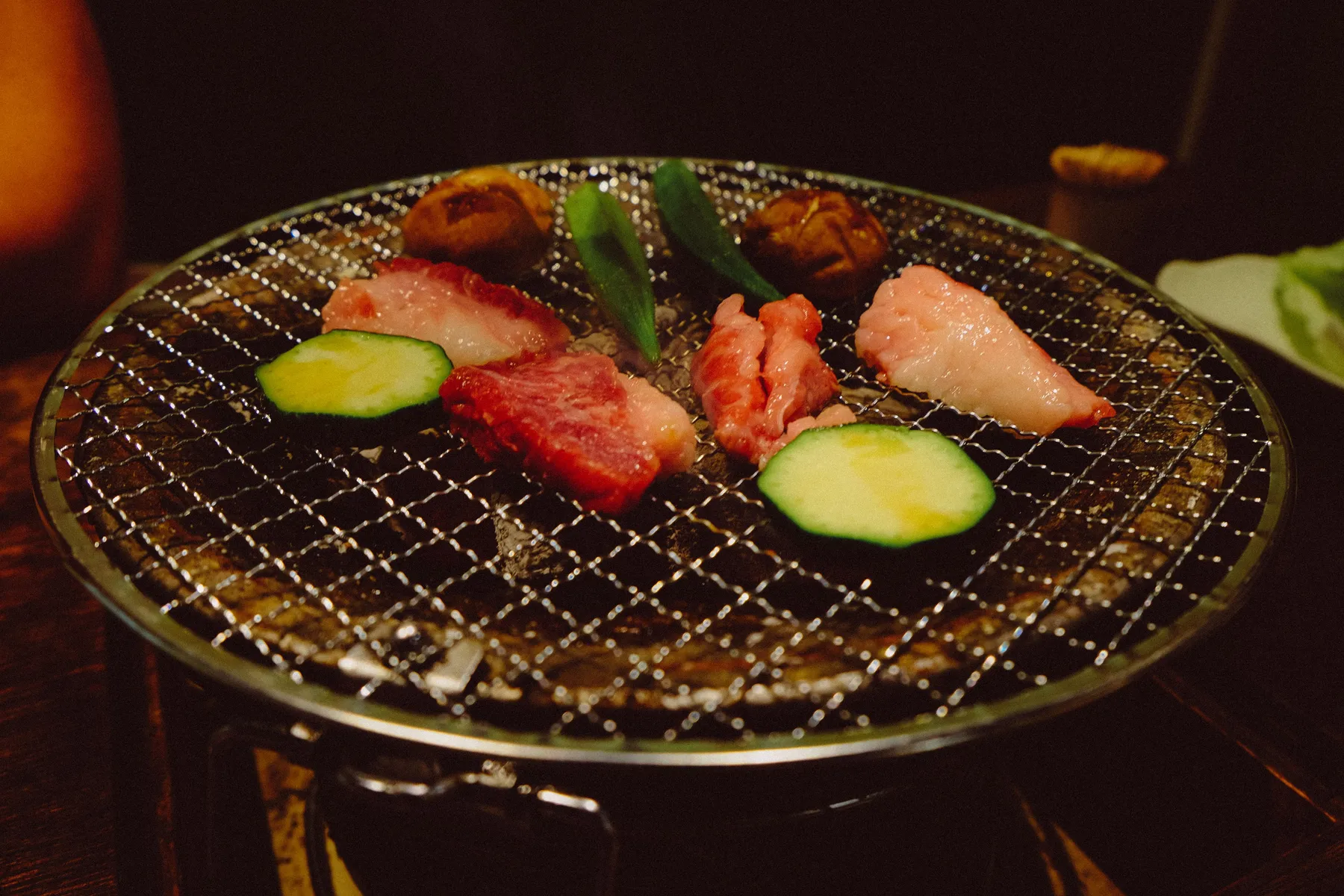 Wagyu and vegetables over charcoal