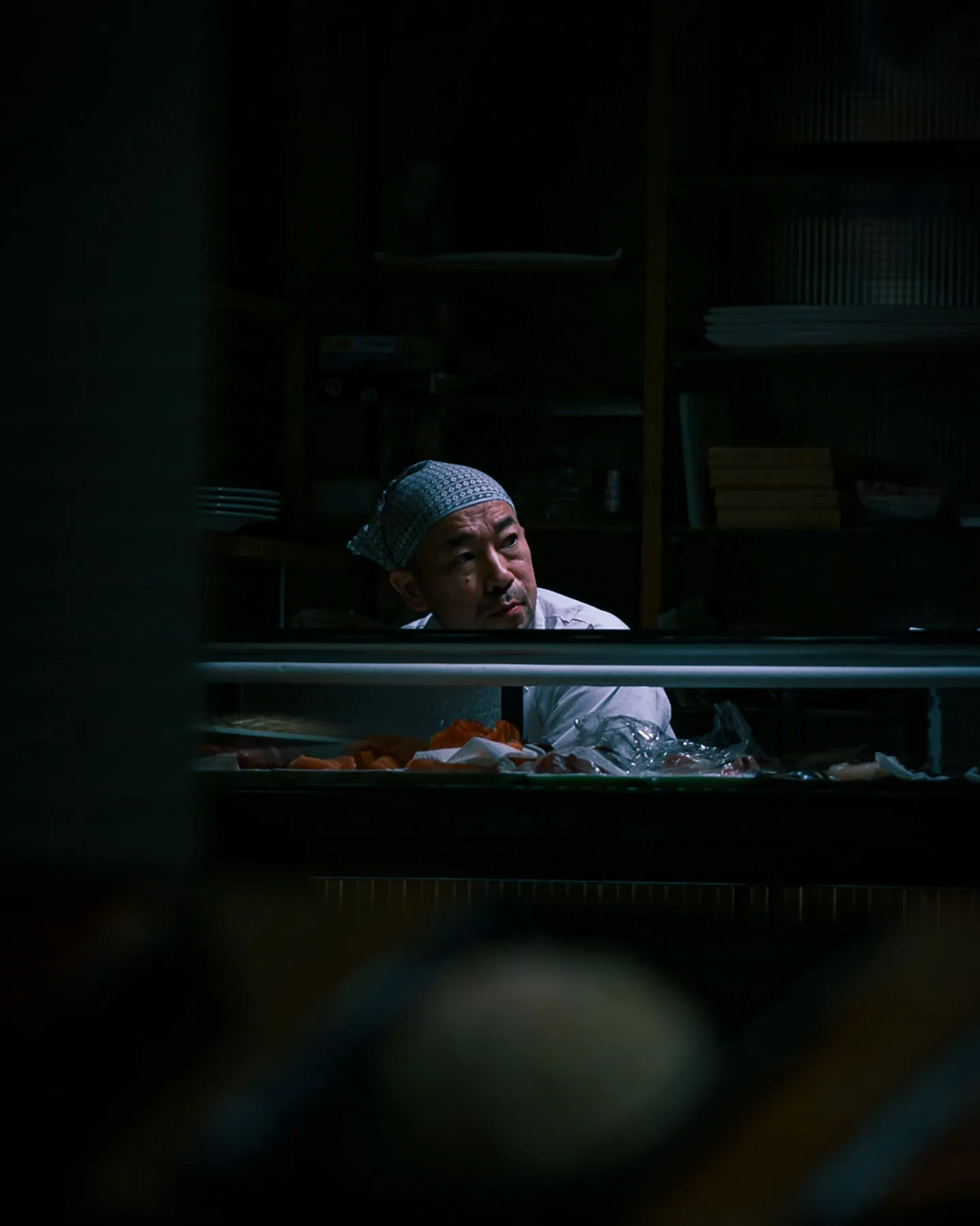 Chef preparing a dish at the counter