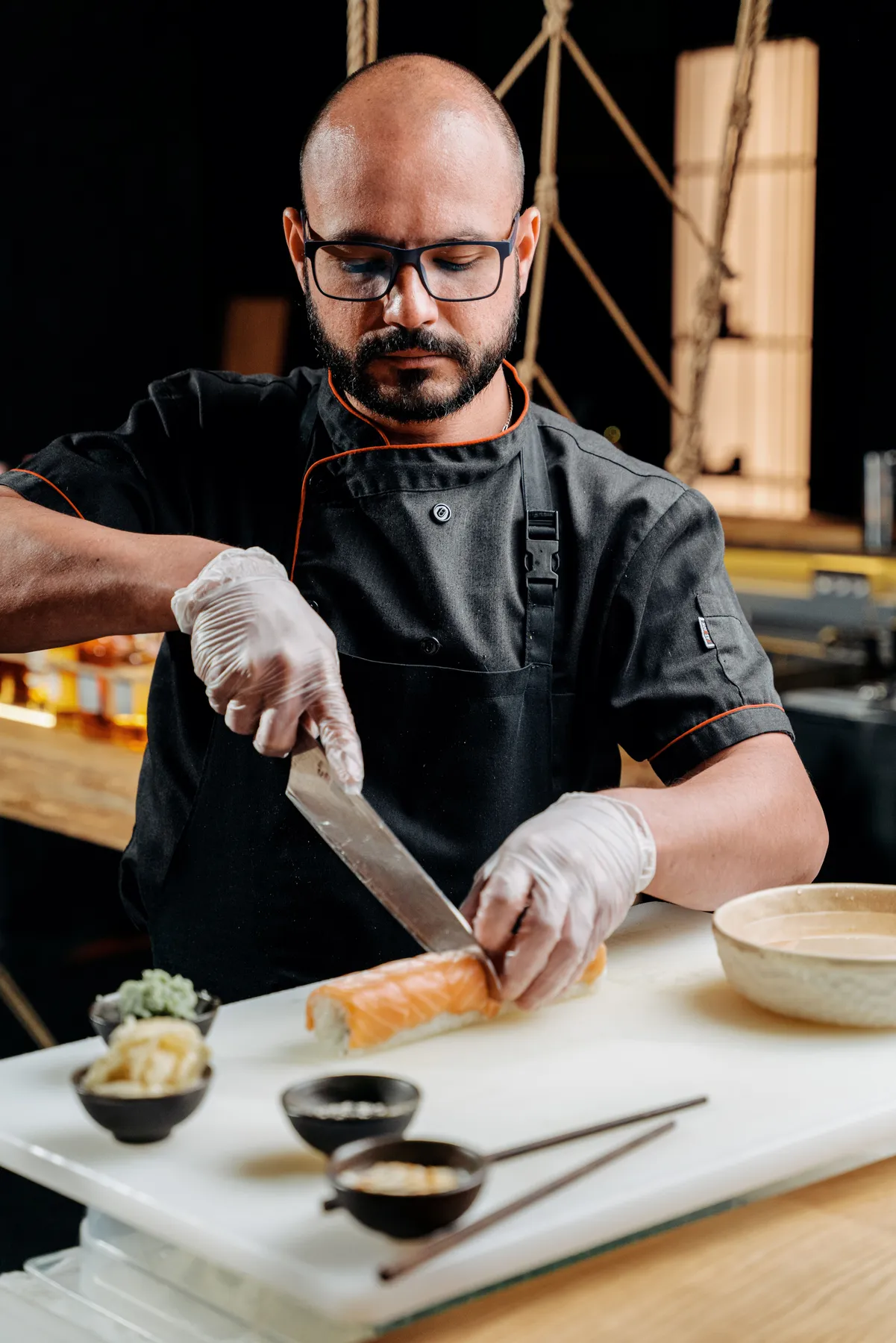 Chef slicing wagyu at the counter